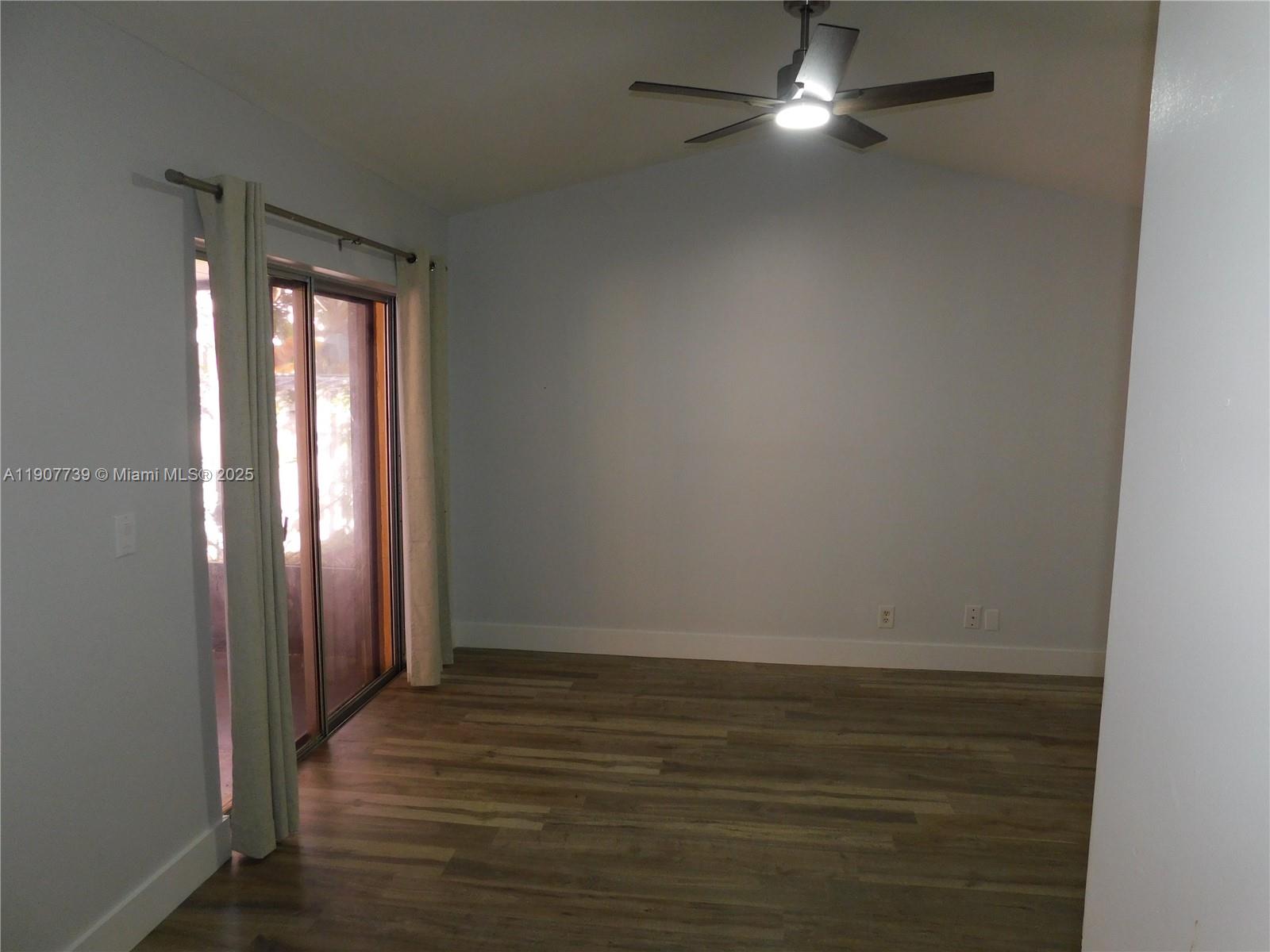 2851 River Run Circle West, Unit 2851 Miramar, FL 33025 - Photo 30 of 33 wooden floor in an empty room