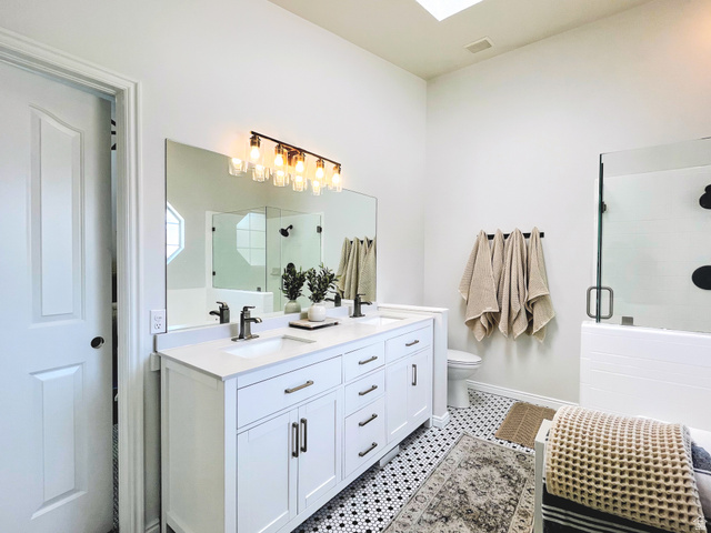 12169 Hidden Valley Road, Unit 44 Sandy, UT 84092 - Photo 19 of 49 Dual vanity with undermount sinks, quartz countertop, and black hardware