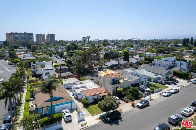 an aerial view of a city with lots of residential buildings
