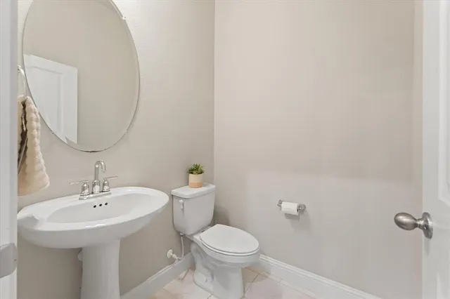 a bathroom with a shower and a sink