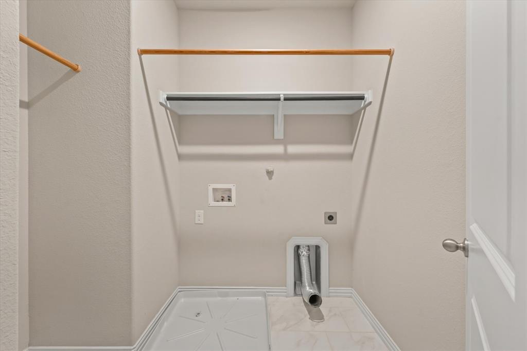 7401 Sunset Boulevard Rowlett, TX 75088 - Photo 18 of 35 a bathroom with a glass shower door