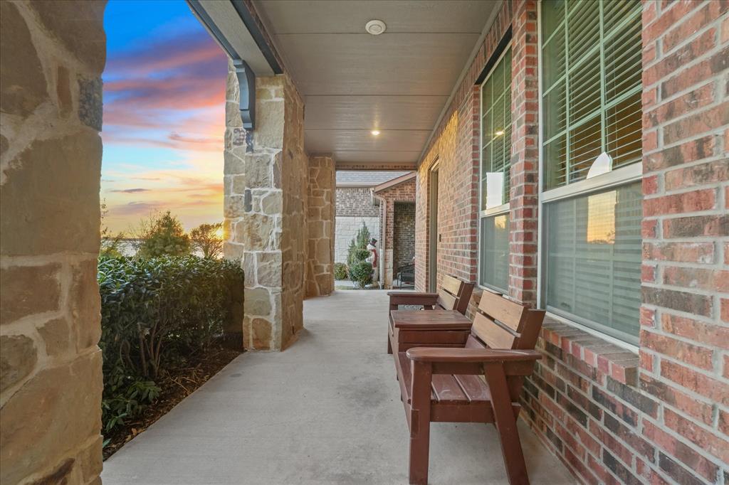 7401 Sunset Boulevard Rowlett, TX 75088 - Photo 30 of 35 a balcony with outdoor seating and city view