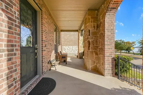 a view of a balcony with lake view and a balcony