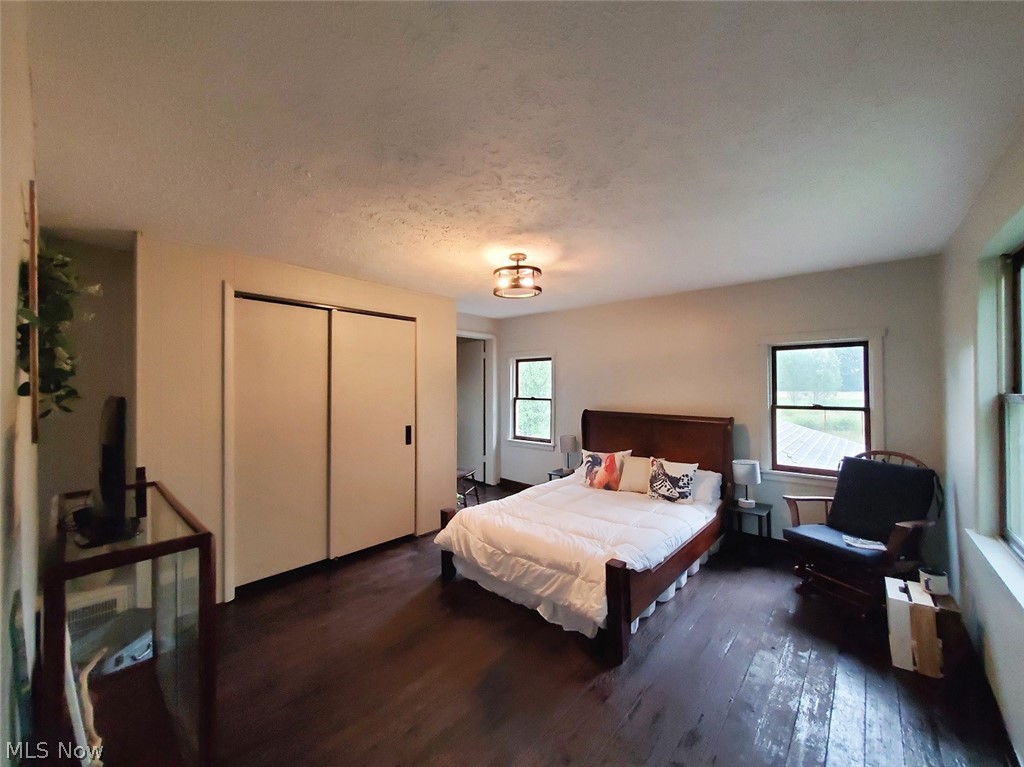 9113 Fewtown Road Deerfield, OH 44411 - Photo 16 of 33 This large bedroom is on the second floor. It also has amazing lake views!