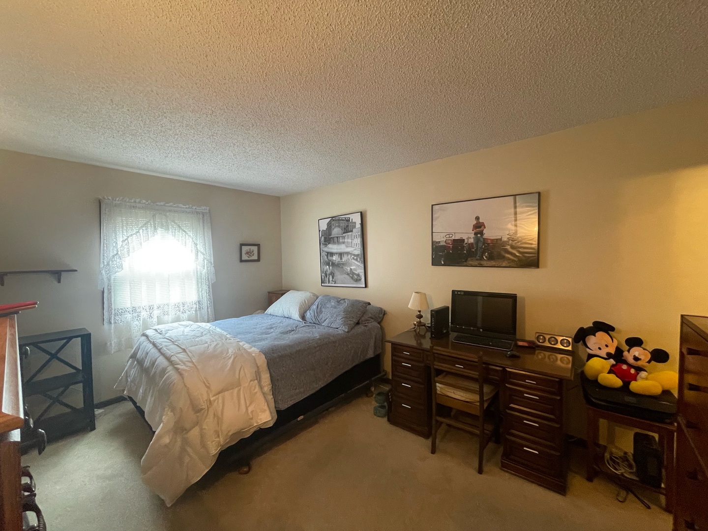 830 South Green Meadow Drive Decatur, IL 62521 - Photo 13 of 26 a bedroom with a bed and a dresser