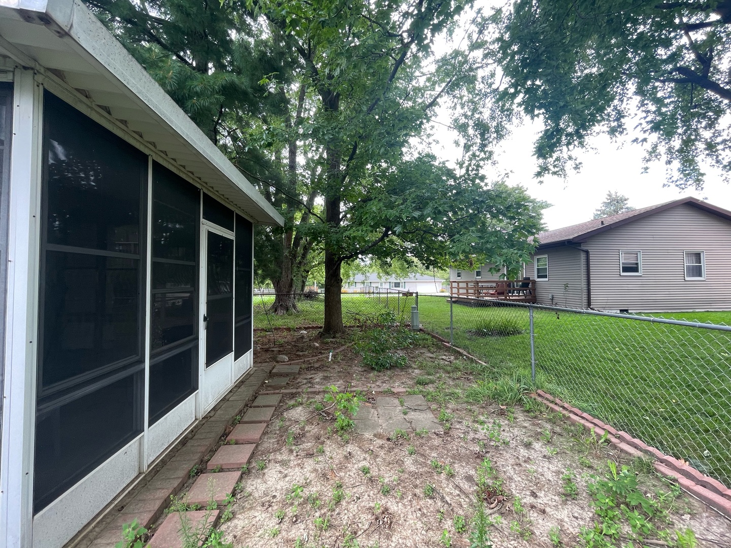 830 South Green Meadow Drive Decatur, IL 62521 - Photo 20 of 26 a view of a house with backyard and trees