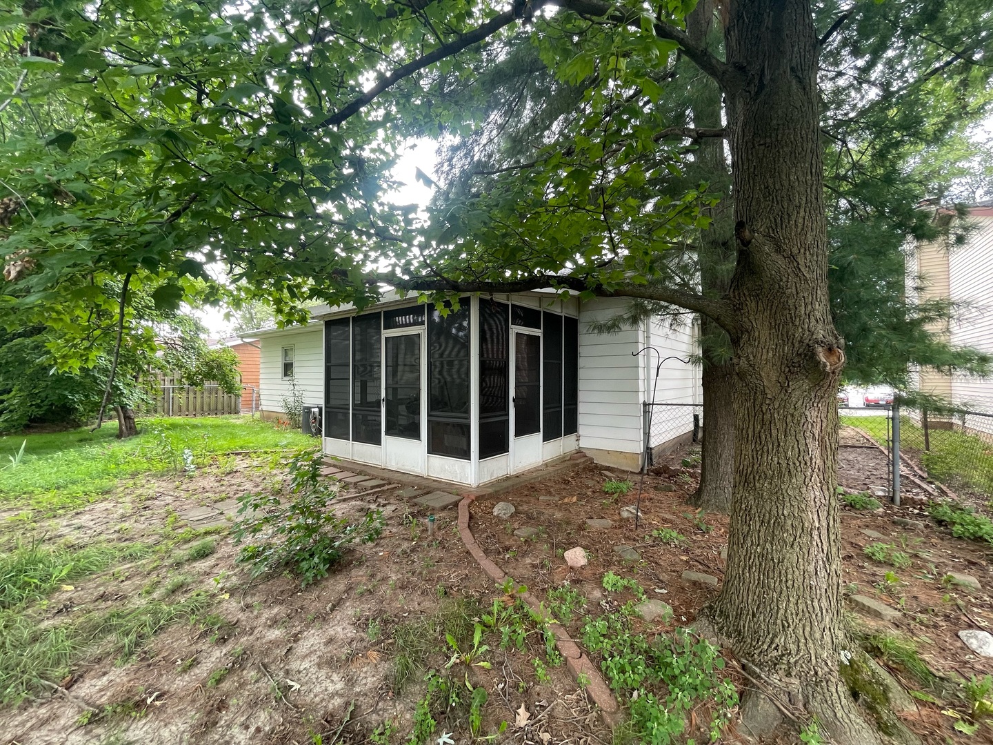 830 South Green Meadow Drive Decatur, IL 62521 - Photo 21 of 26 a view of a house with a yard