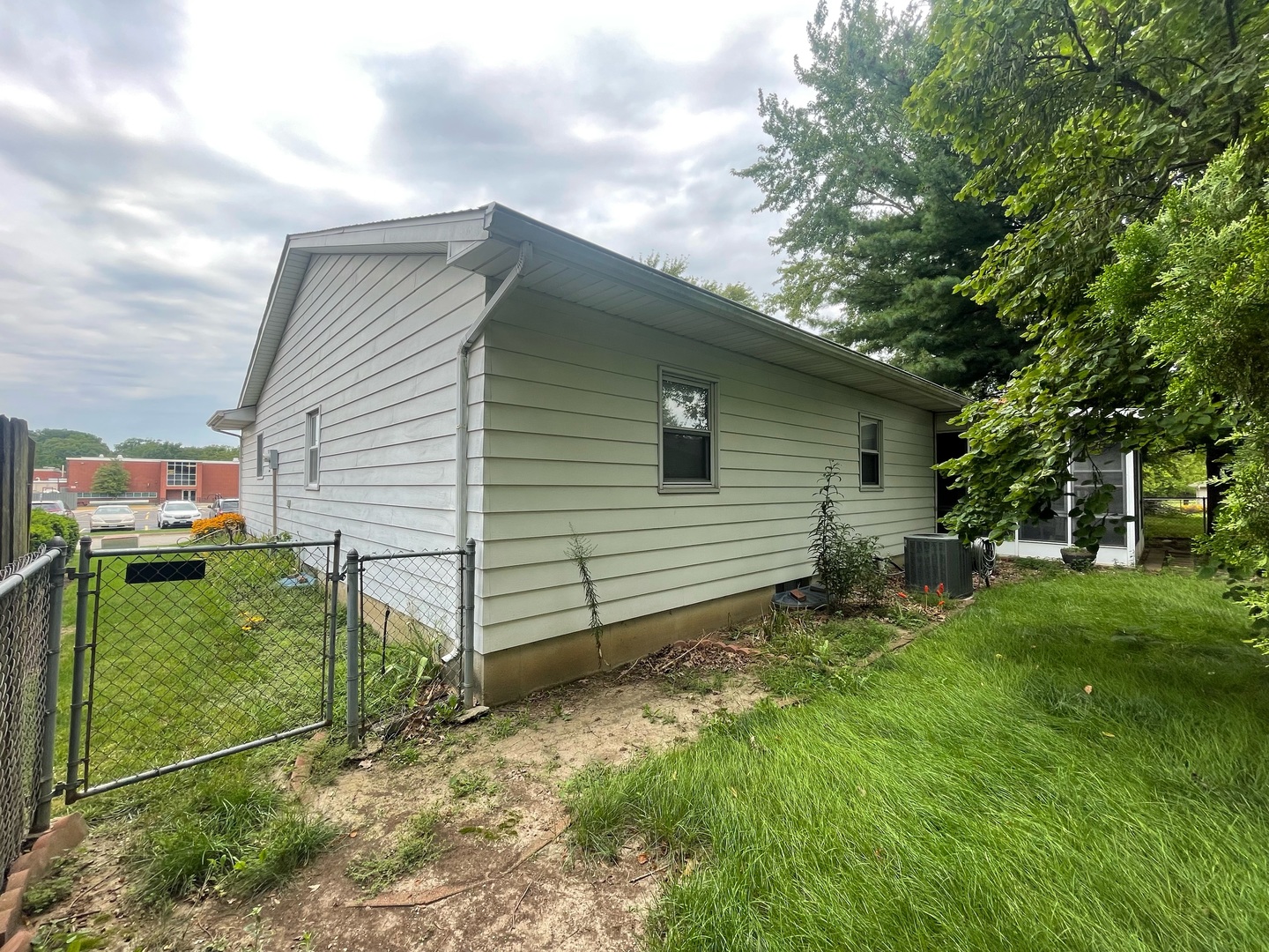 830 South Green Meadow Drive Decatur, IL 62521 - Photo 26 of 26 a view of a house with a backyard