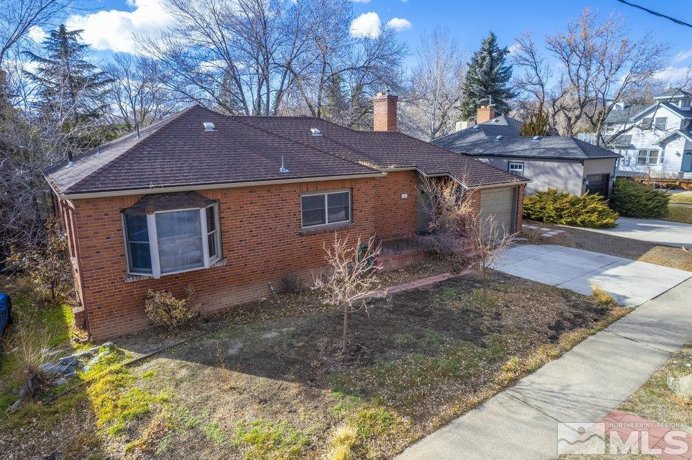 847 Washington Street Reno, NV 89503 - Photo 2 of 29 a view of a house with a yard
