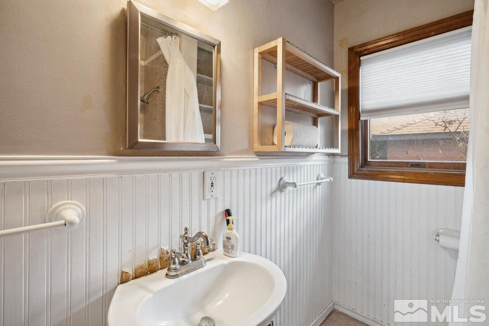 847 Washington Street Reno, NV 89503 - Photo 22 of 29 a bathroom with a sink and a mirror