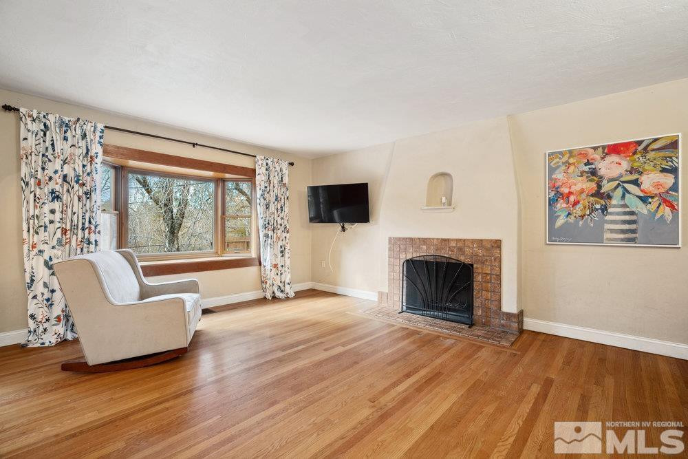 847 Washington Street Reno, NV 89503 - Photo 5 of 29 a view of a livingroom with furniture and a fireplace