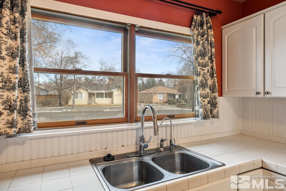 847 Washington Street Reno, NV 89503 - Photo 10 of 29 a bathroom with a sink and a window