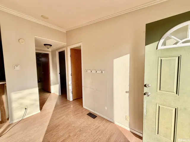 a view of kitchen with refrigerator stove and microwave