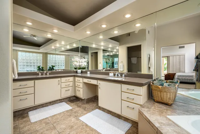a large kitchen with granite countertop lots of counter top space