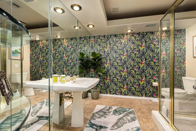 a bathroom with a sink and a shower