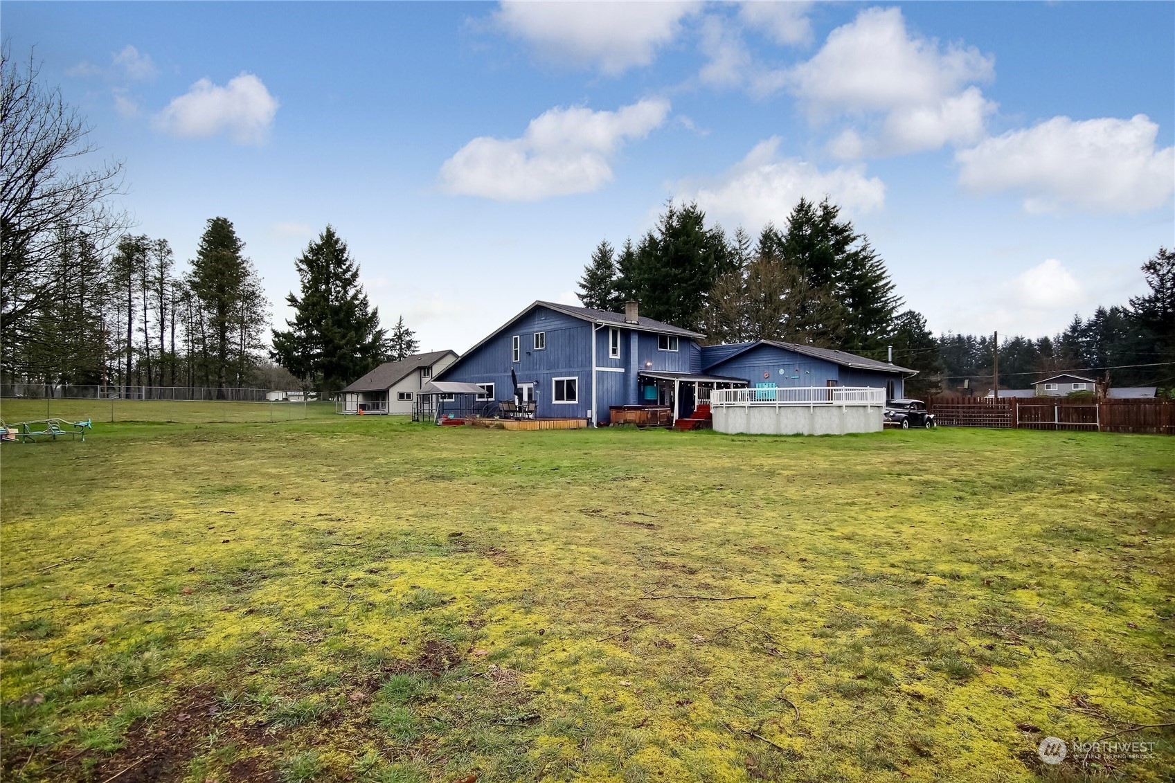 18623 Joselyn Road Southwest Rochester, WA 98579 - Photo 39 of 40 a house view with swimming pool in front of it