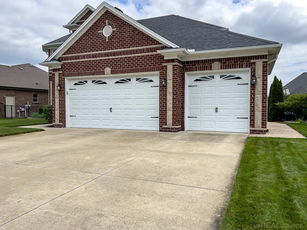 16070 Moore Park Road Macomb, MI 48044 - Photo 55 of 76 3 car attached with openers