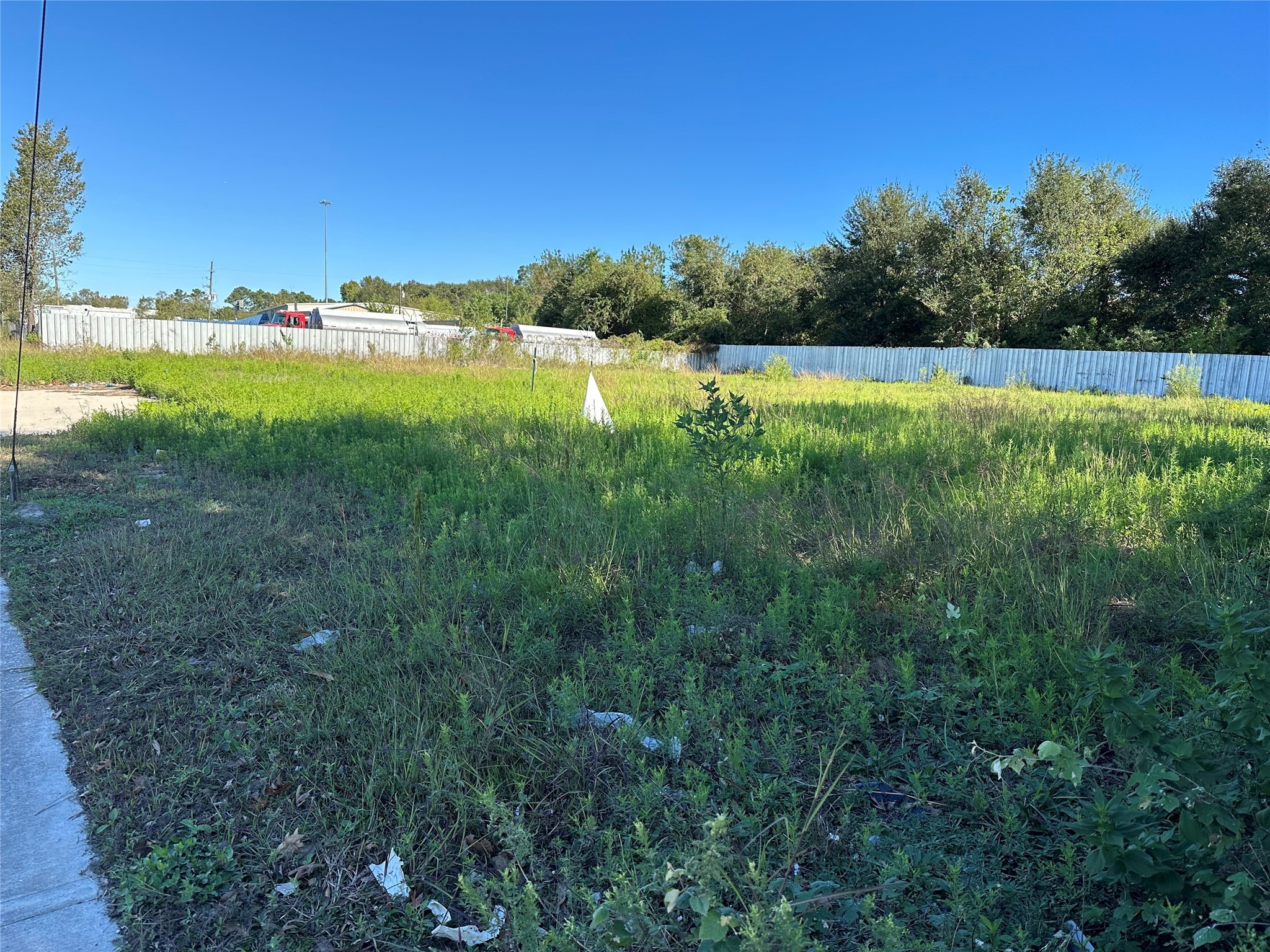 16124 Aldine Westfield Road Houston, TX 77032 - Photo 2 of 2 a view of a lake with houses in the back