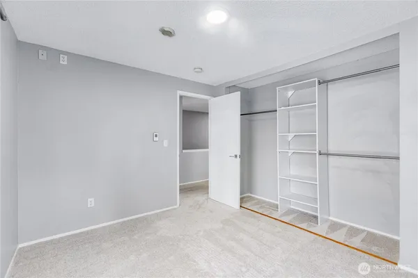a view of a room with a hallway