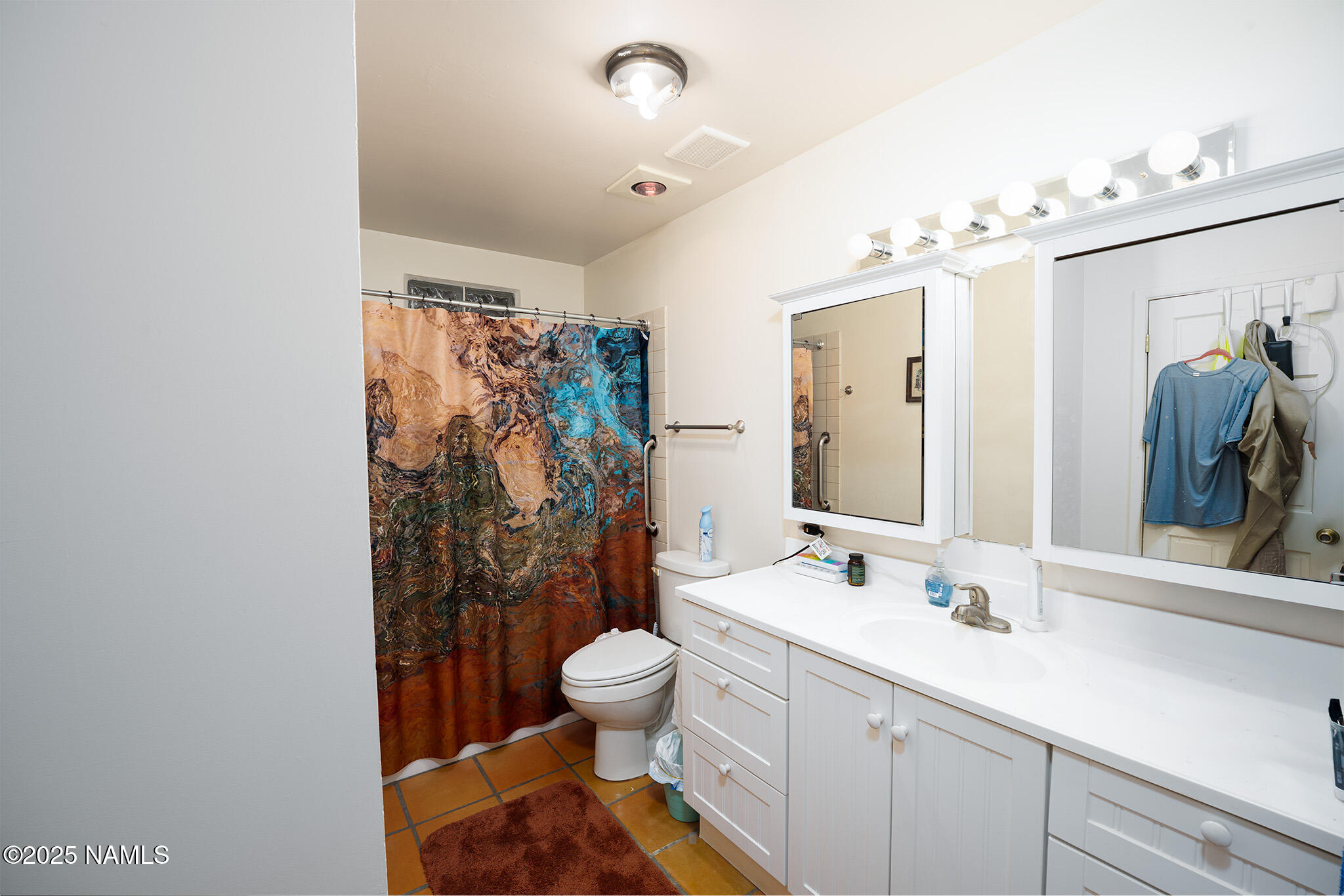 90 Vultee Road Sedona, AZ 86351 - Photo 15 of 25 a bathroom with a sink toilet and shower