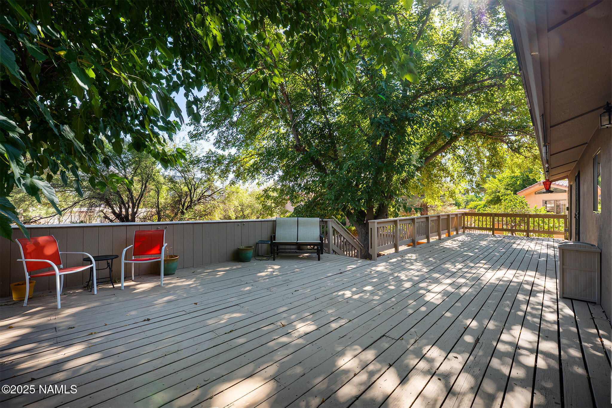 90 Vultee Road Sedona, AZ 86351 - Photo 16 of 25 a view of deck with wooden floor and seating space