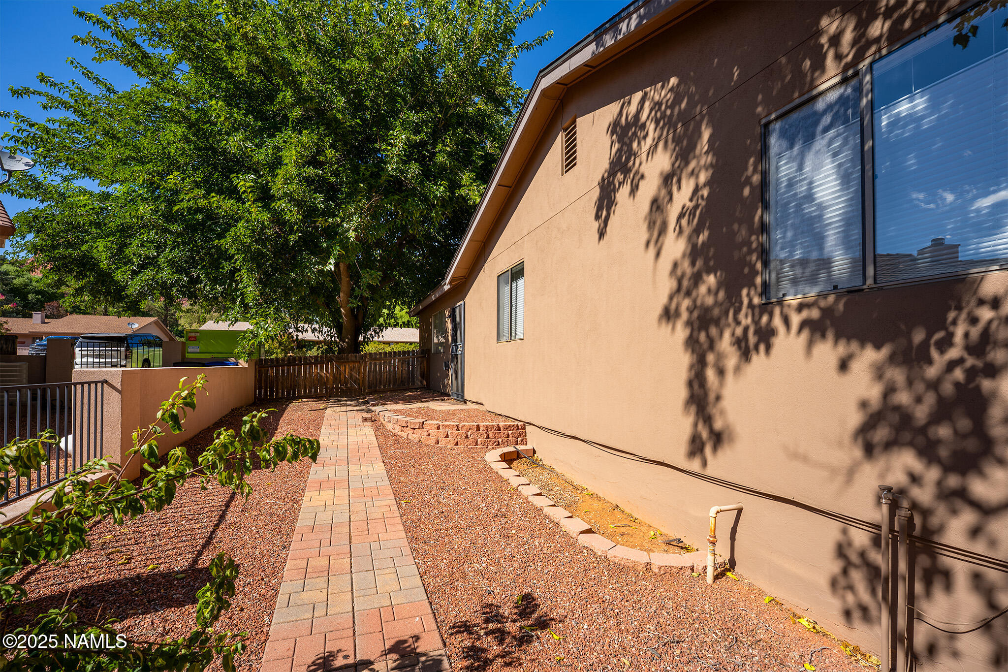 90 Vultee Road Sedona, AZ 86351 - Photo 20 of 25 a view of a house with a small yard