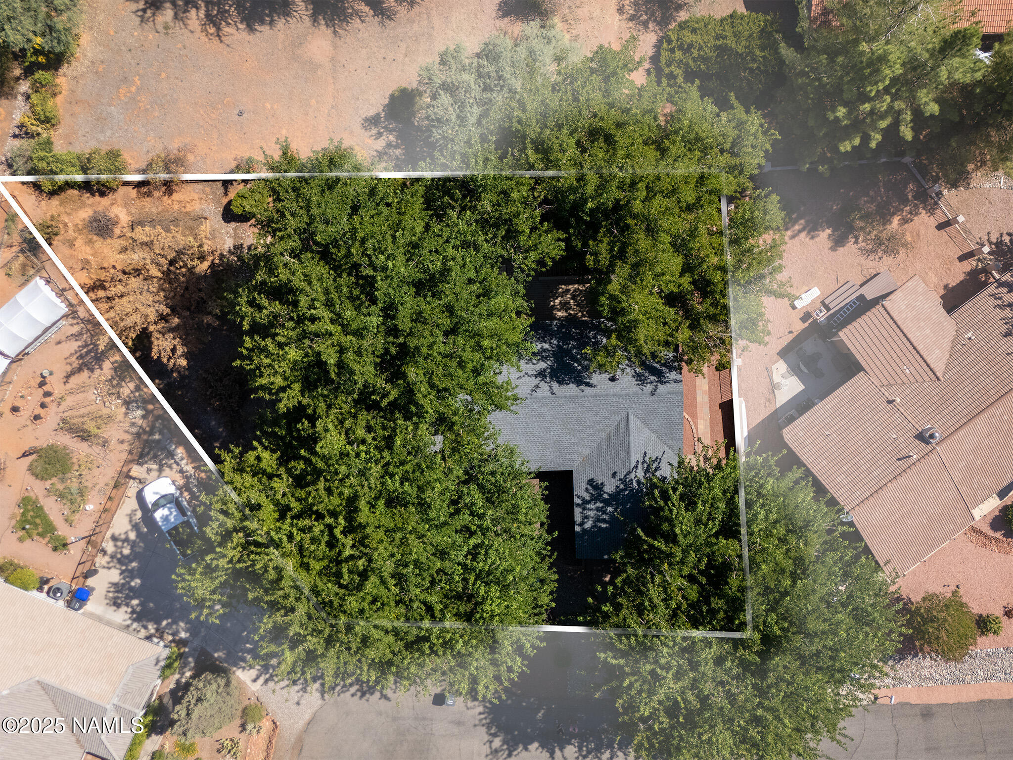 90 Vultee Road Sedona, AZ 86351 - Photo 25 of 25 an aerial view of a house with a yard and lake view