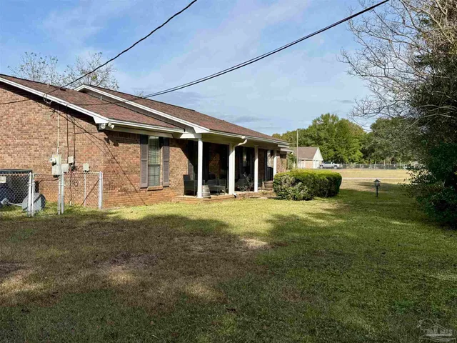 a bathroom with a toilet a sink and a shower