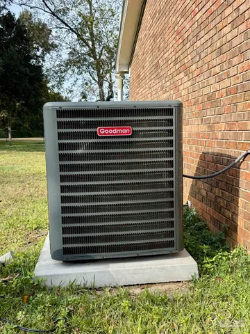 a view of a bench in the backyard