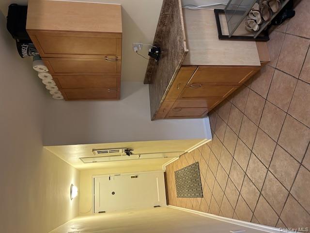 450 Pelham Road, Unit 1B New Rochelle, NY 10805 - Photo 9 of 10 a kitchen with a sink and cabinets