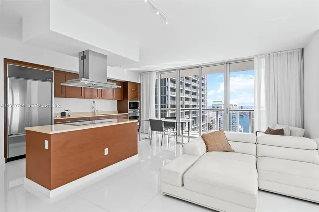 a view of a kitchen cabinets and wooden floor