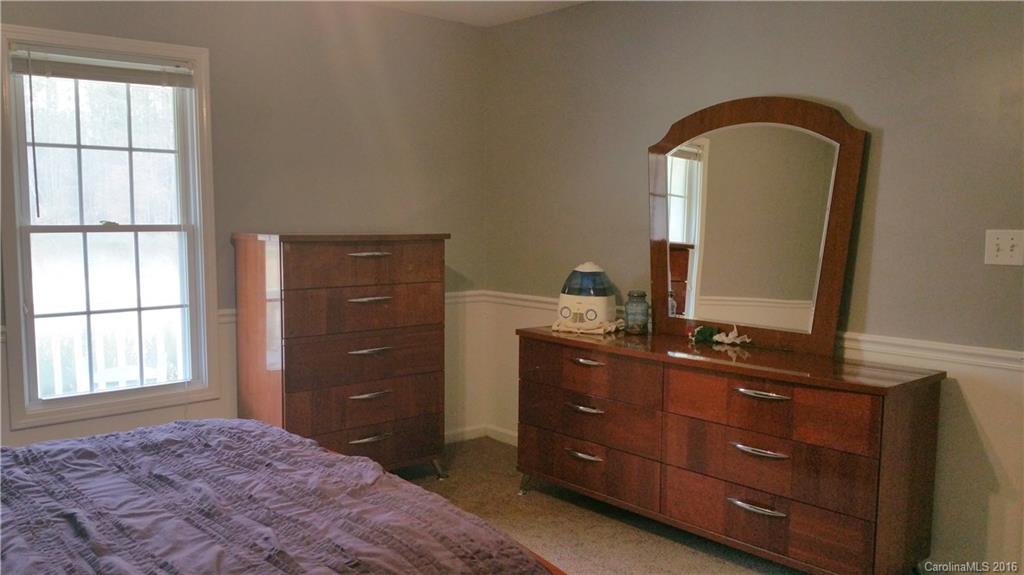 1348 Lawrence Road Clover, SC 29710 - Photo 12 of 21 a bedroom with a bed and a dresser