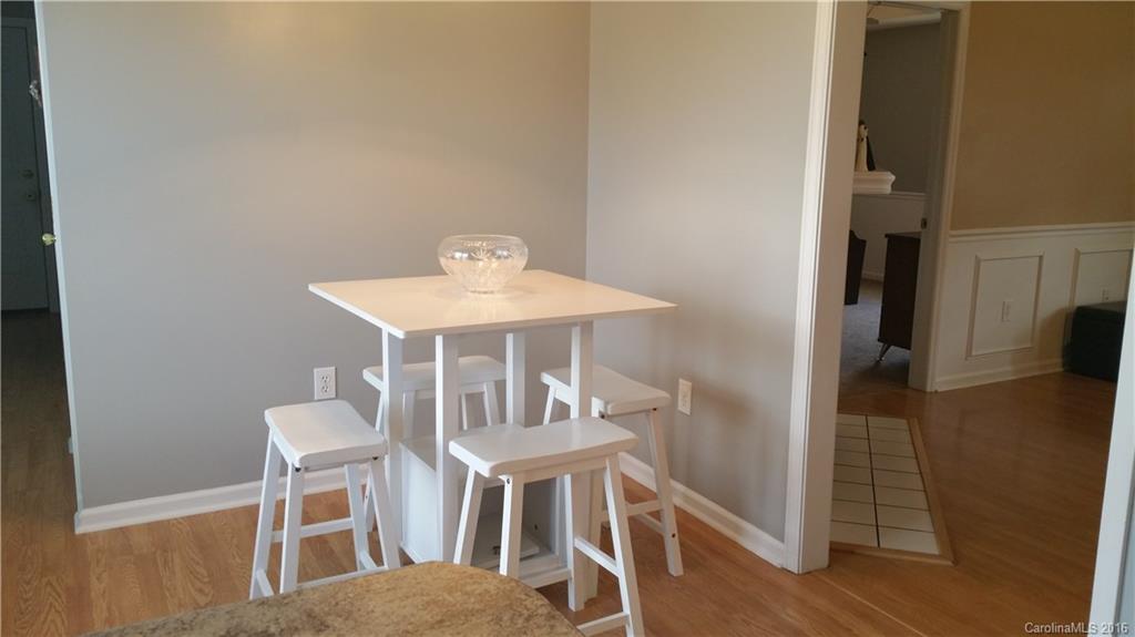 1348 Lawrence Road Clover, SC 29710 - Photo 6 of 21 a view of a dining room with furniture and wooden floor