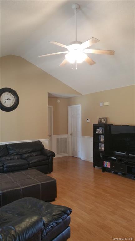 1348 Lawrence Road Clover, SC 29710 - Photo 8 of 21 a living room with furniture and a flat screen tv