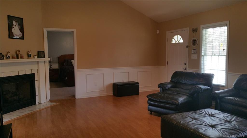 1348 Lawrence Road Clover, SC 29710 - Photo 10 of 21 a living room with furniture and a fireplace