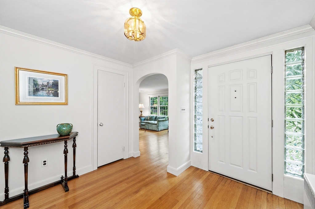 68 Gloucester Road Westwood, MA 02090 - Photo 3 of 30 a view of an entryway with wooden floor