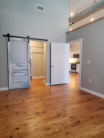 a view of room with hardwood floor