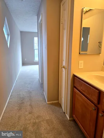 a view of a bathroom with a sink