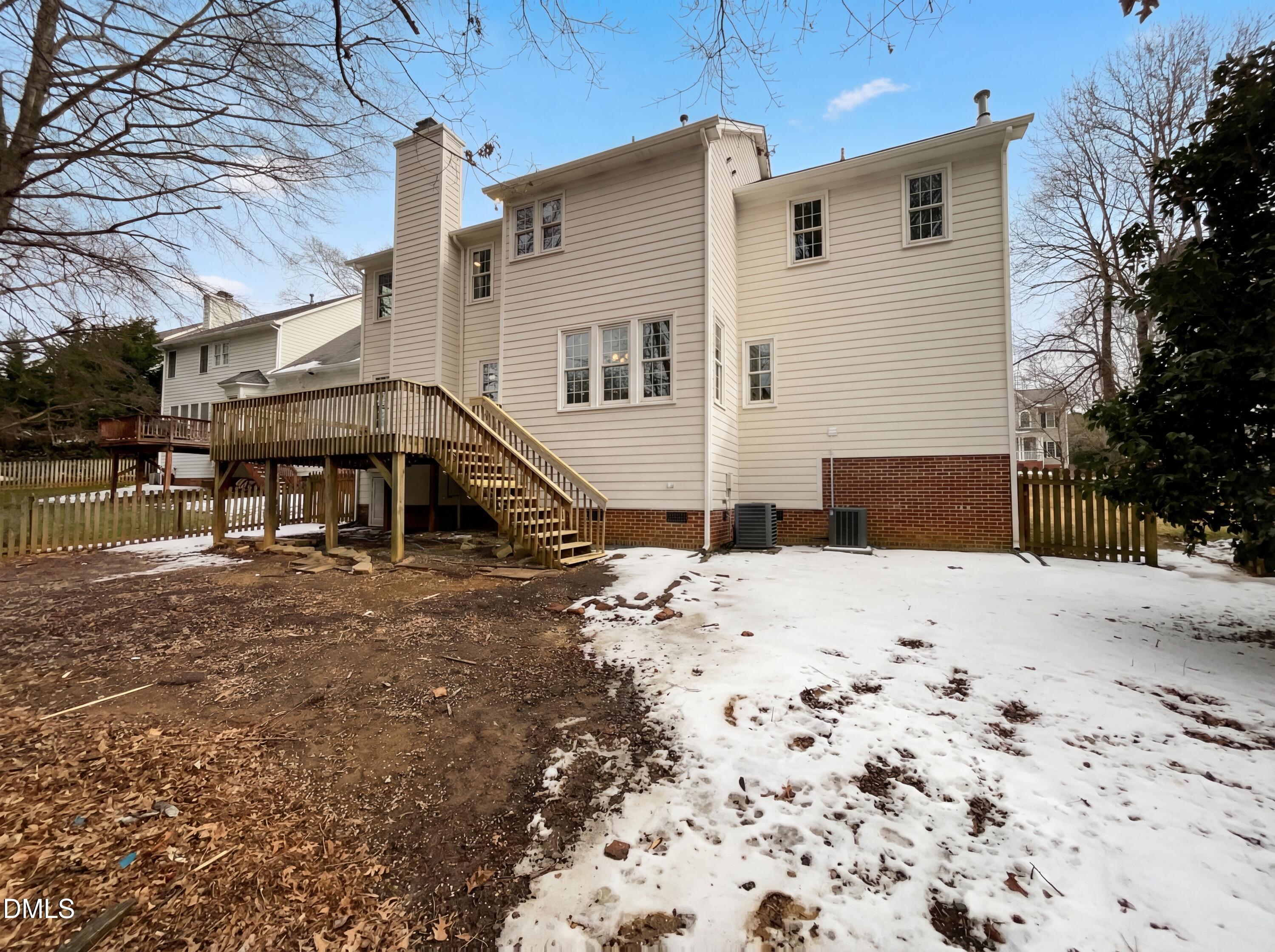 12213 Freemont Lane Raleigh, NC 27613 - Photo 5 of 19 a view of a house with a yard