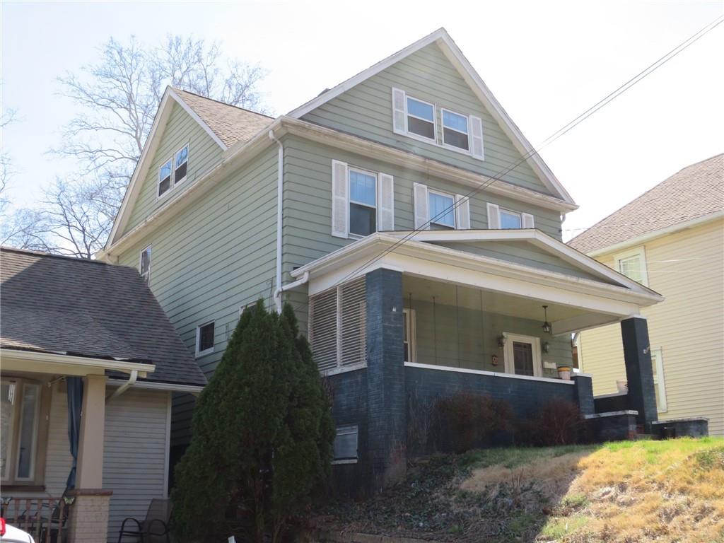20 Beech Street Ambridge, PA 15003 - Photo 2 of 44 a front view of a house with a yard