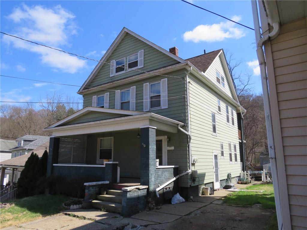 20 Beech Street Ambridge, PA 15003 - Photo 3 of 44 a front view of a house with a yard