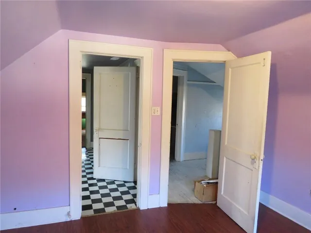 a bathroom with mirror sink and window