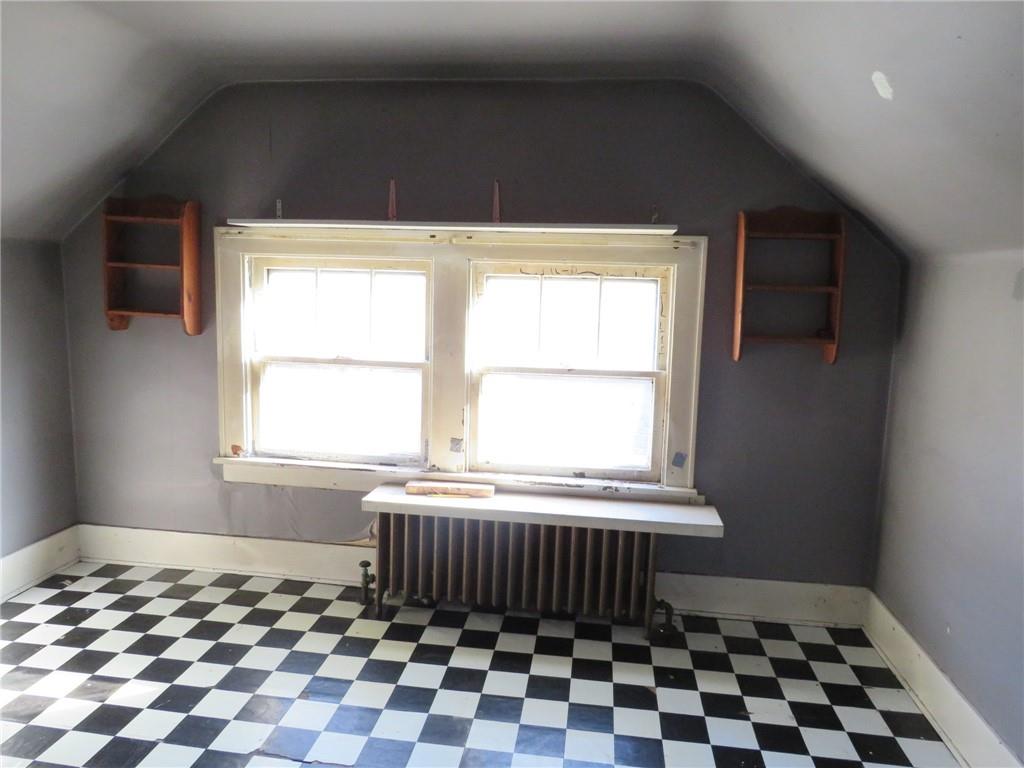 20 Beech Street Ambridge, PA 15003 - Photo 39 of 44 a bathroom with a black and white checkered floor