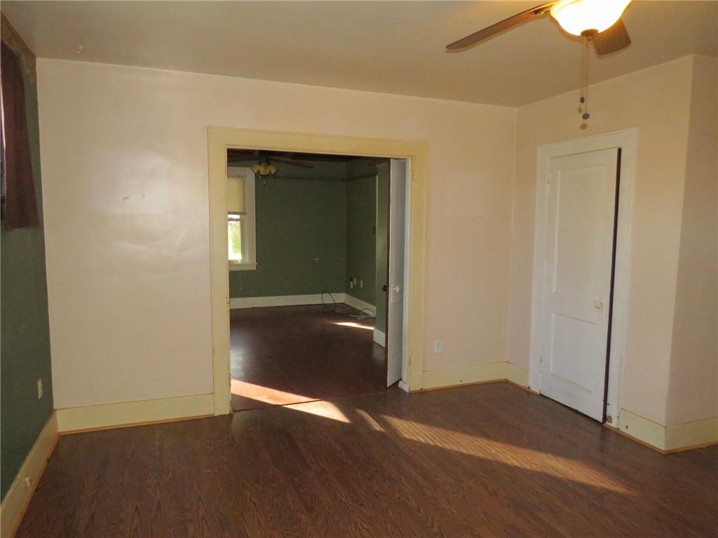 20 Beech Street Ambridge, PA 15003 - Photo 8 of 44 an empty room with wooden floor and closet