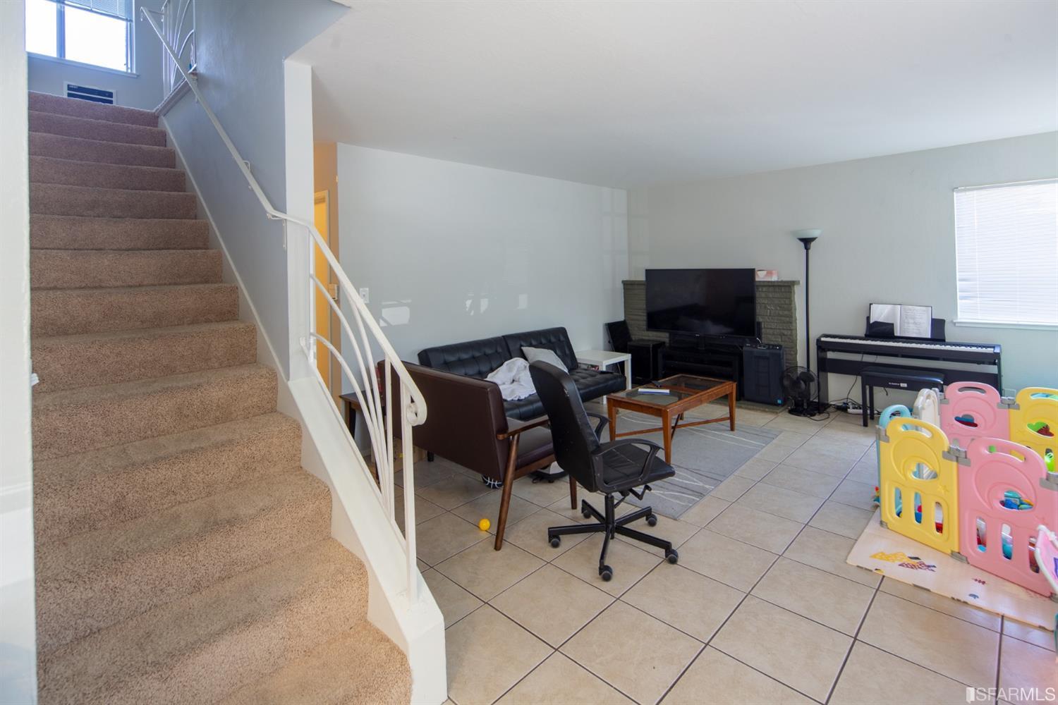 1455 Bay Street Alameda, CA 94501 - Photo 23 of 39 a view of a entryway with workspace and stairs