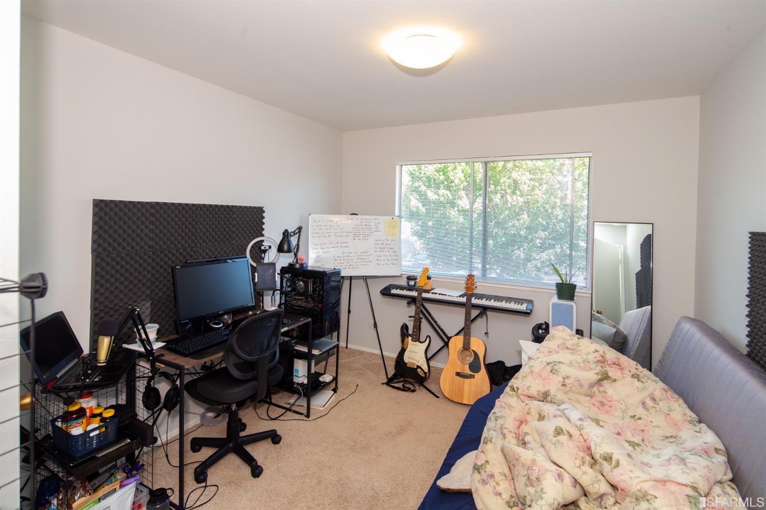 1455 Bay Street Alameda, CA 94501 - Photo 32 of 39 a view of a workspace with furniture and a window