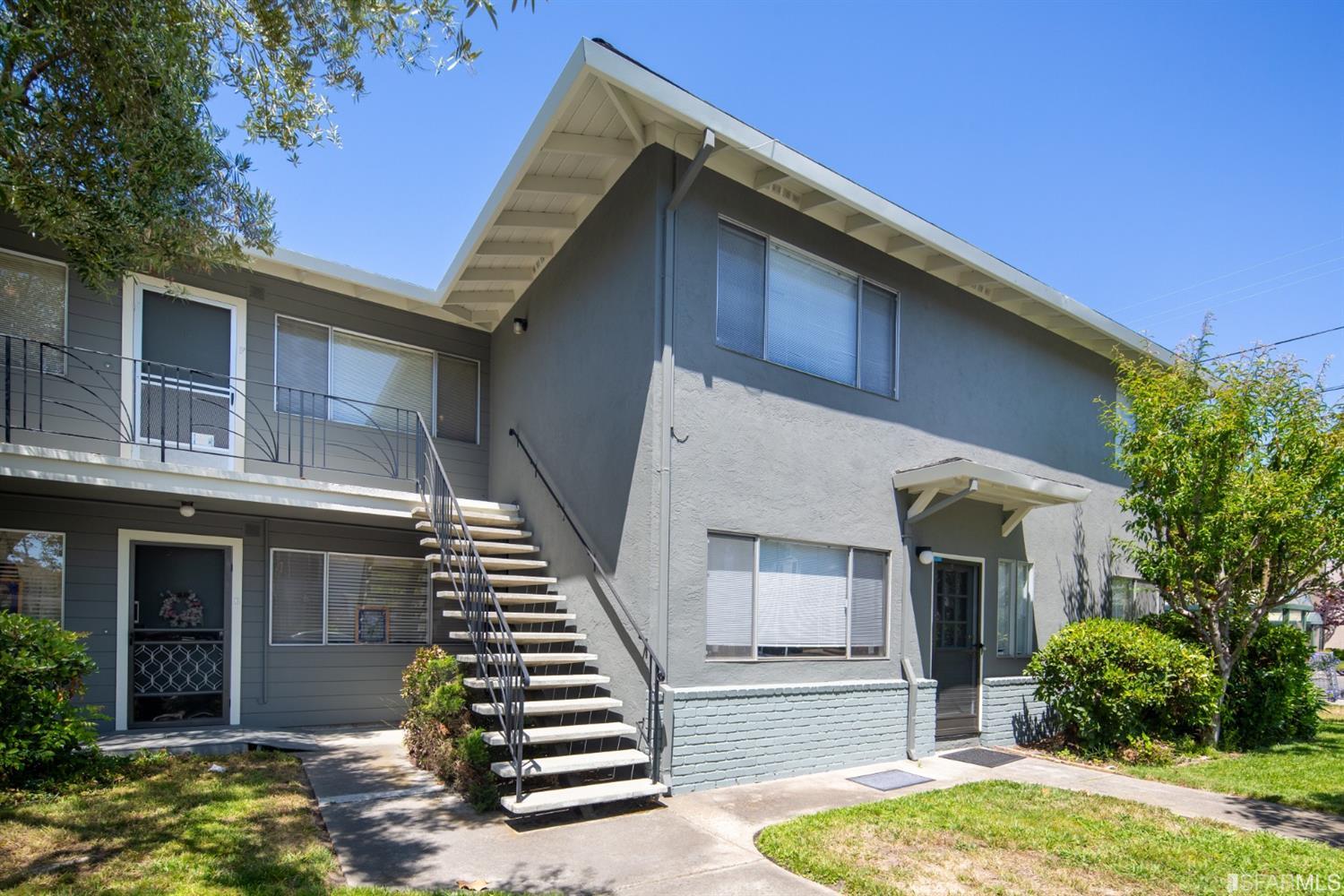 1455 Bay Street Alameda, CA 94501 - Photo 10 of 39 a front view of a house with garage