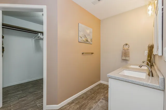 a bathroom with a shower and a toilet