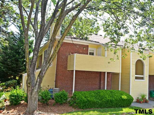 3625 Mill Run, Unit 5 Raleigh, NC 27612 - Photo 1 of 22 a view of a house with a tree