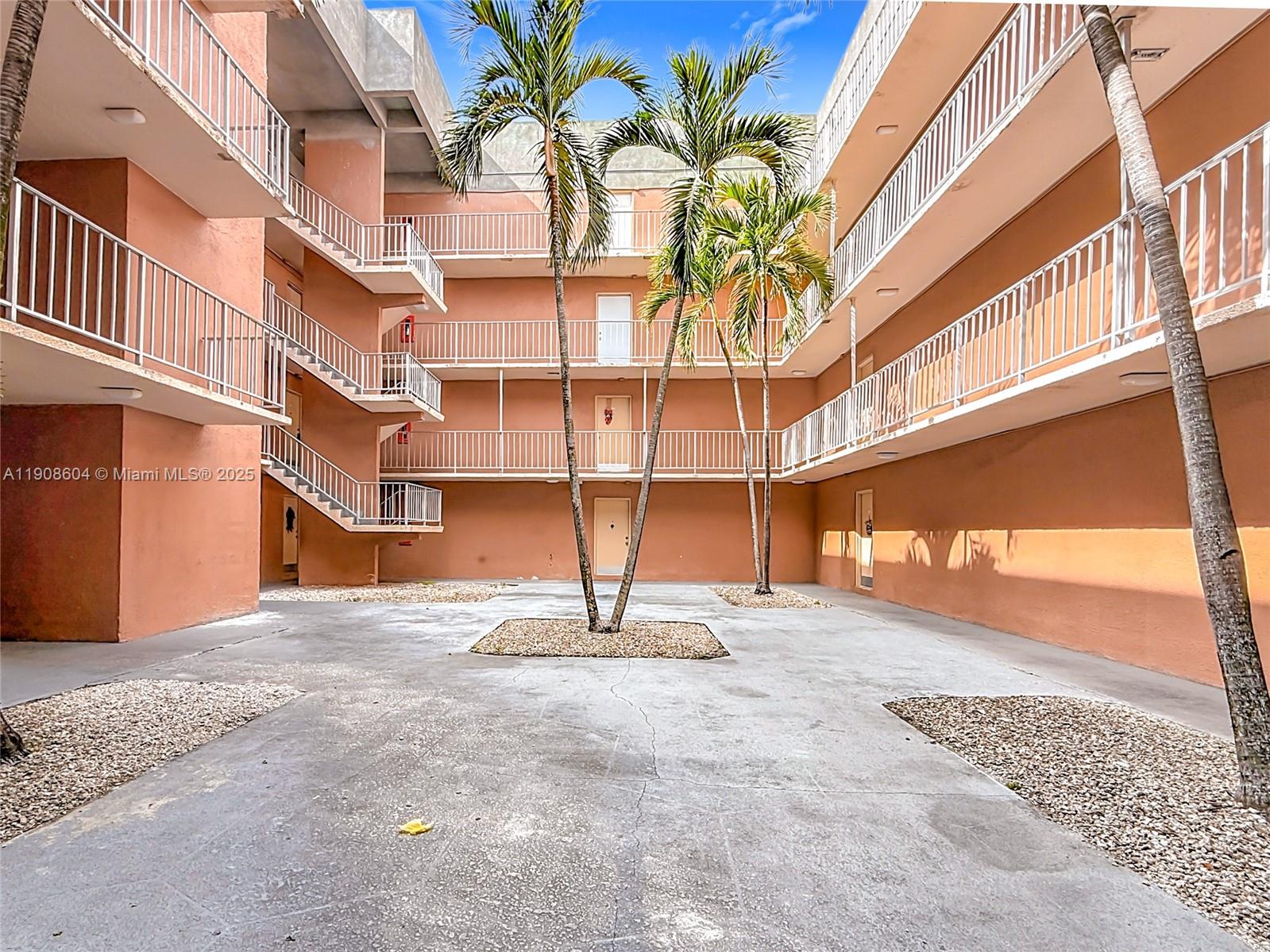 a view of backyard with a outdoor space